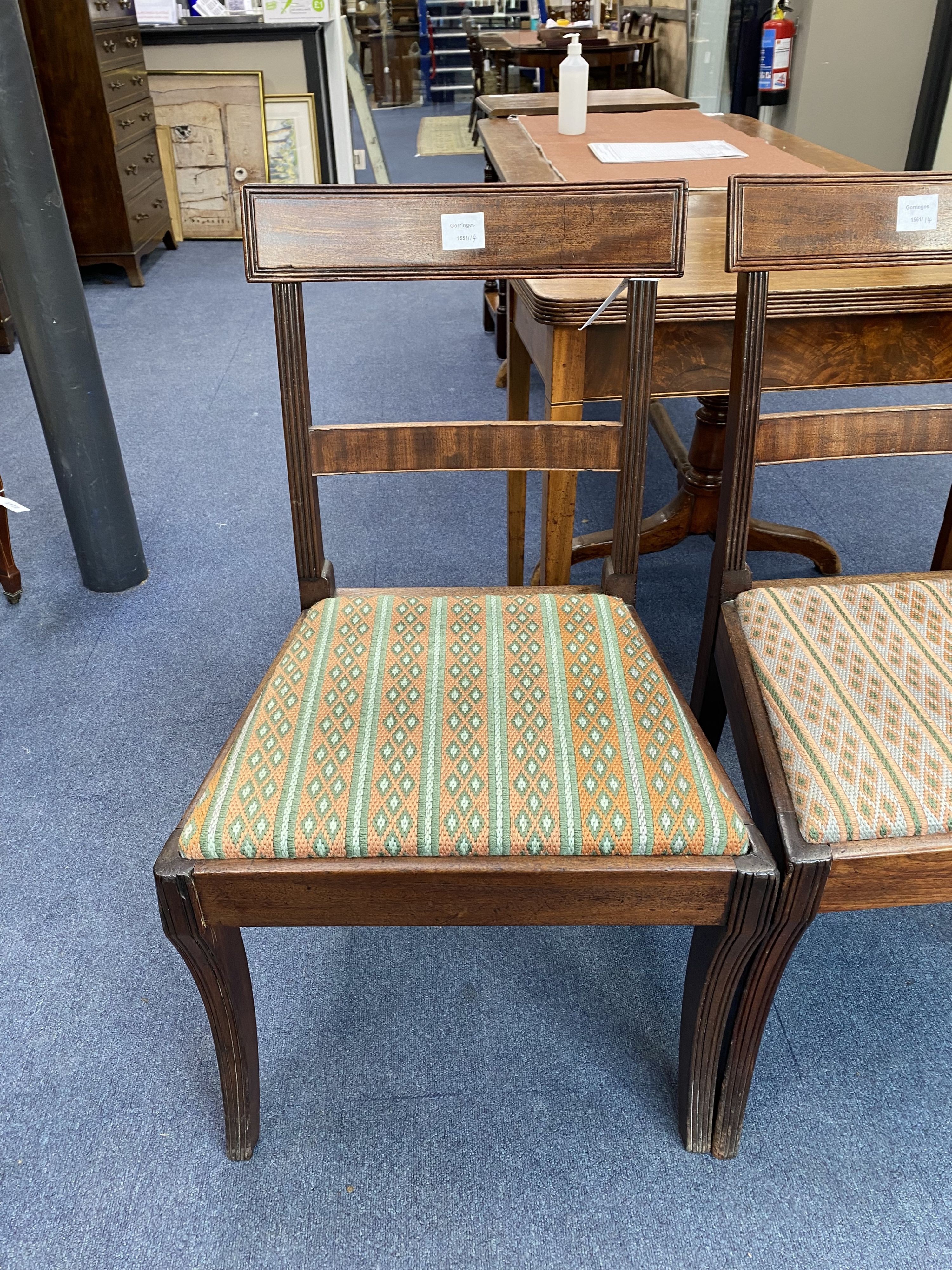 A Regency mahogany elbow chair and three others